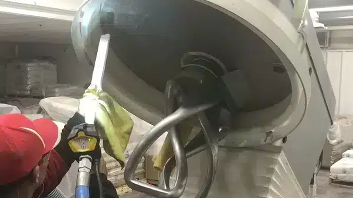 Cold Jet dry ice blasting removes dough residue and grease from a dough mixer